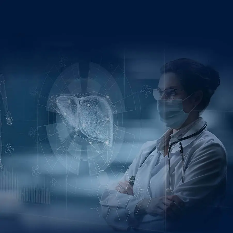 Healthcare professional with a futuristic holographic projection of a liver, representing BeLiver's advanced AI-driven diagnostics